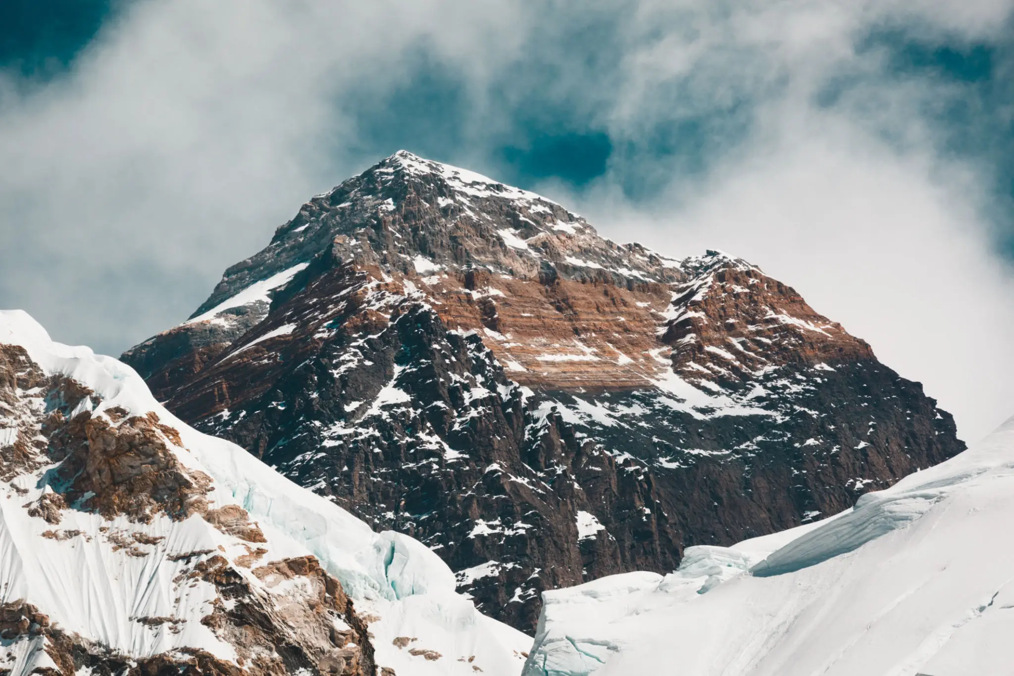 Rocky mountain top surrounded by clouds