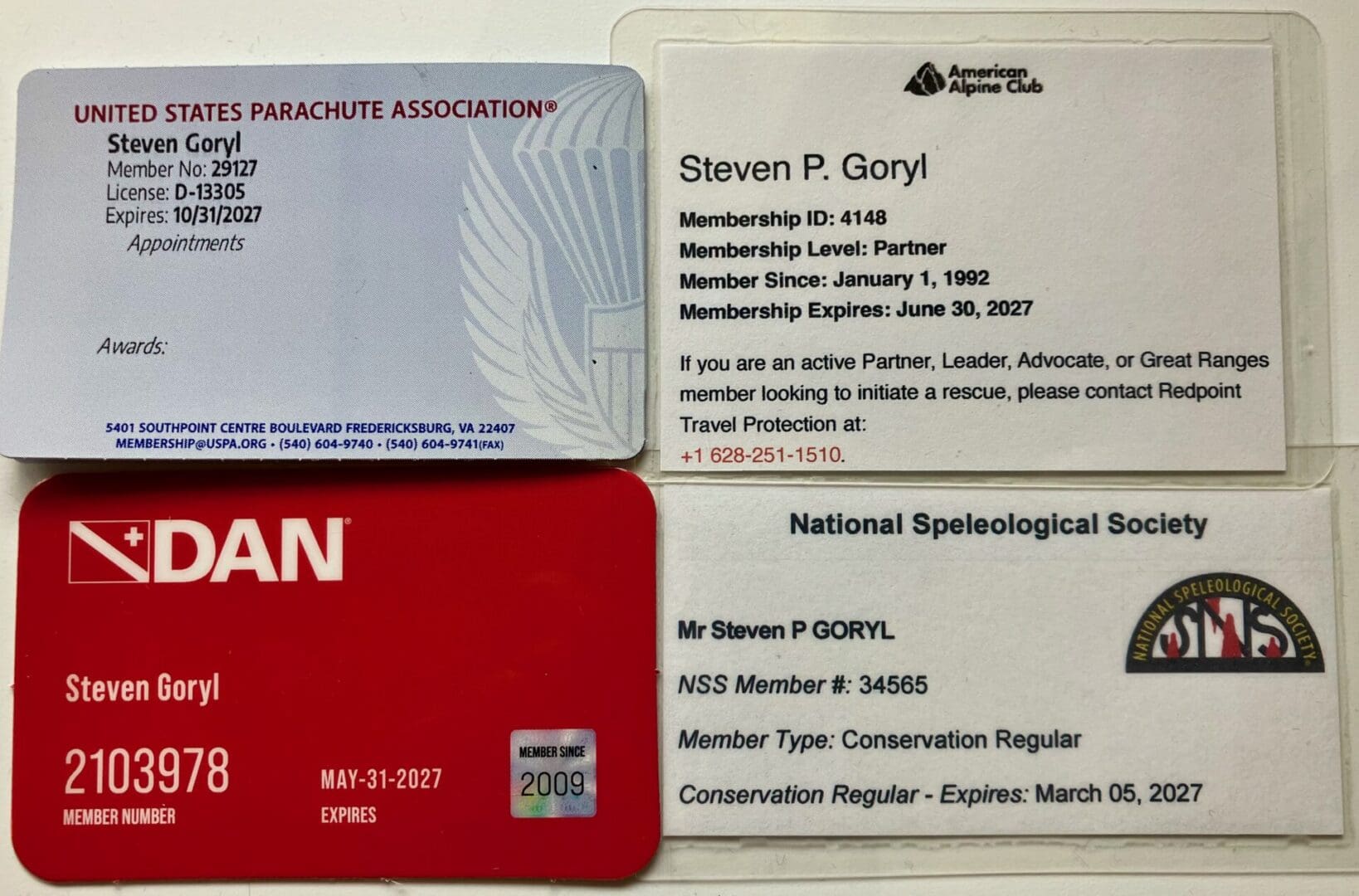 Four membership cards from outdoor organizations